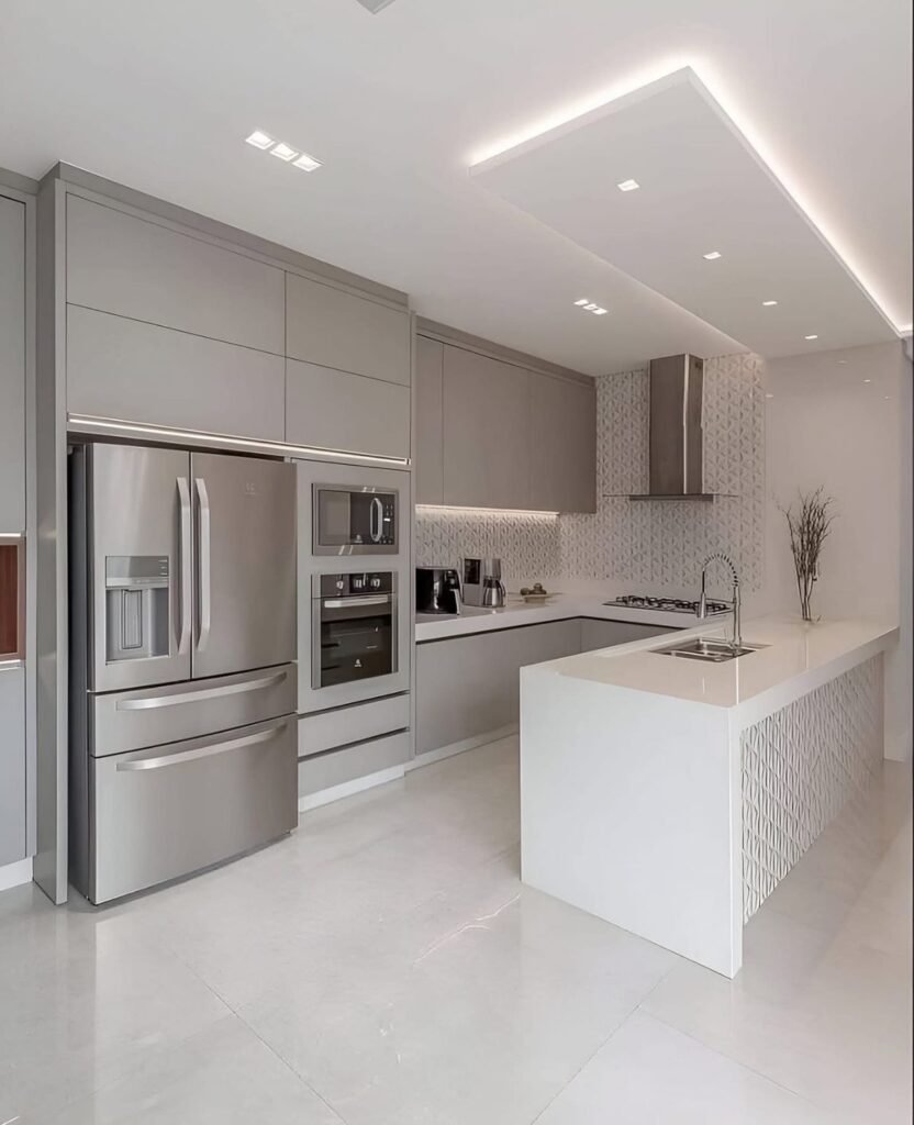 مطبخ مفتوح بديكور مودرن مع جزيرة وسطية